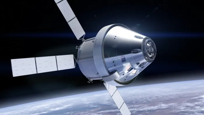 Rendering of ORION spacecraft in orbit above the earth. Image credit NASA.